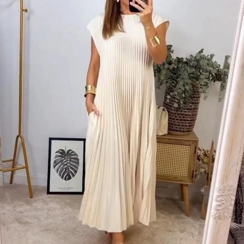 Women's flowing pleated maxi dress with dropped shoulders and side pockets StylebySassy