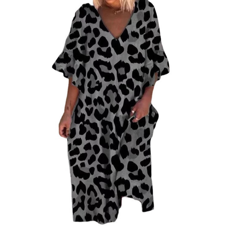 Ladies' casual midi dress in tunic style with V-neck, ruffled sleeves, and side pockets StylebySassy