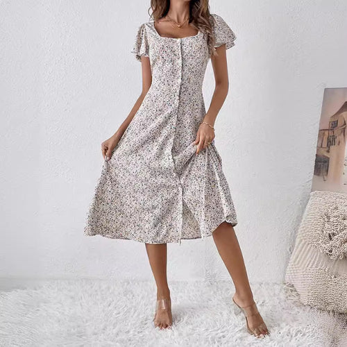Women's fitted midi dress with square neckline, concealed button placket, and flowing A-line skirt StylebySassy