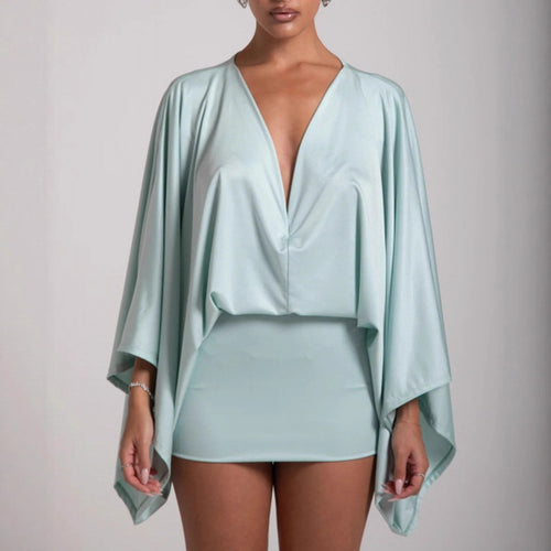 Women nan cape mini dress with deep V-neck, batwing sleeves and tailored mini skirt StylebySassy