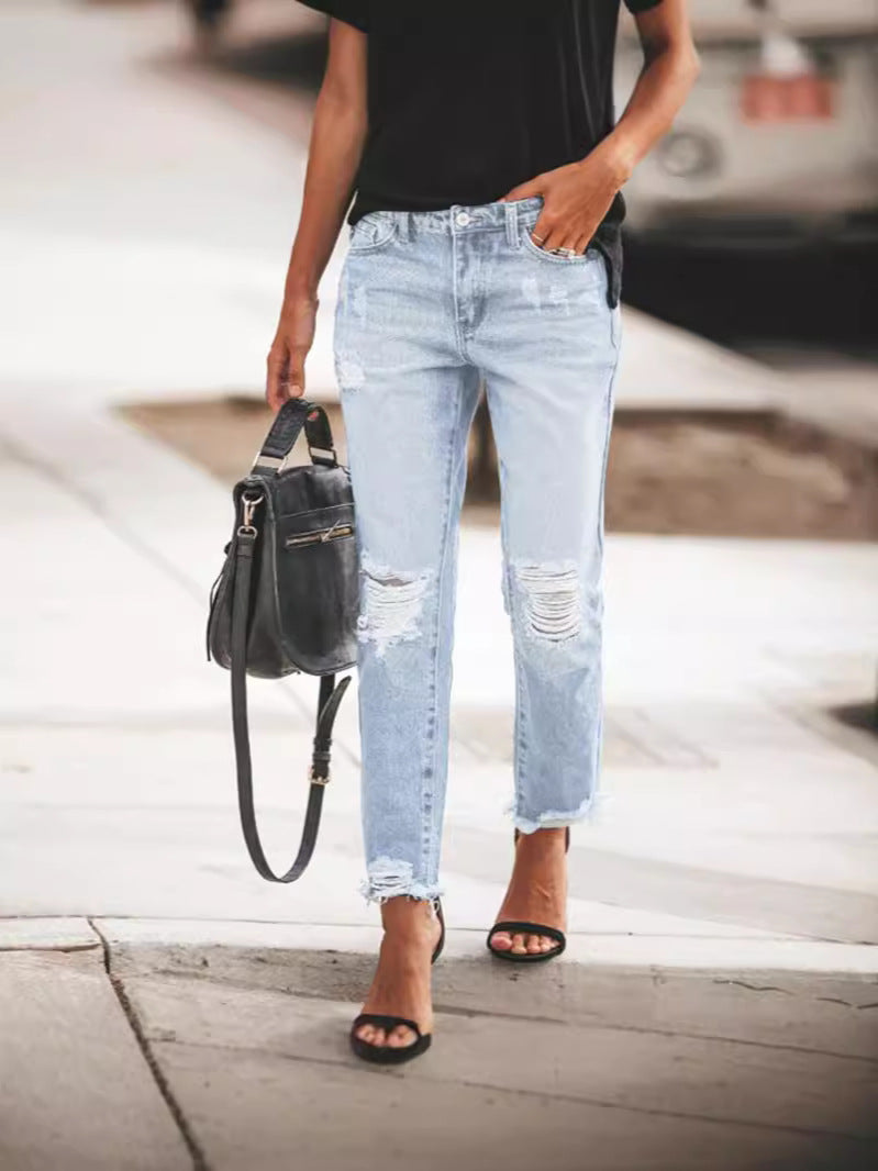 Ladies Ripped Denim Jeans with relaxed fit and frayed hem StylebySassy