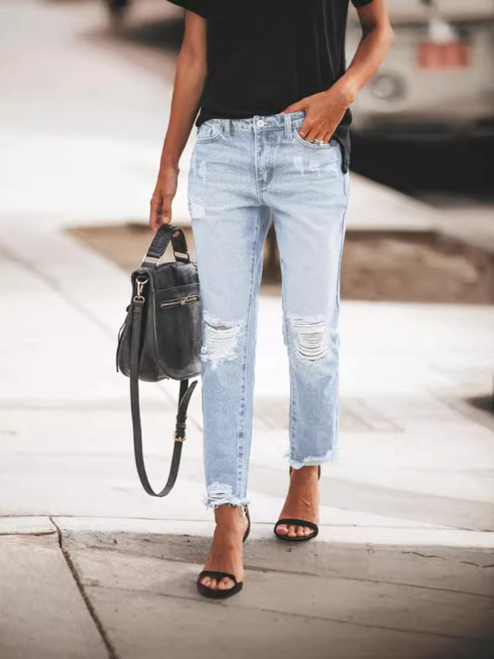 Ladies Ripped Denim Jeans with relaxed fit and frayed hem StylebySassy