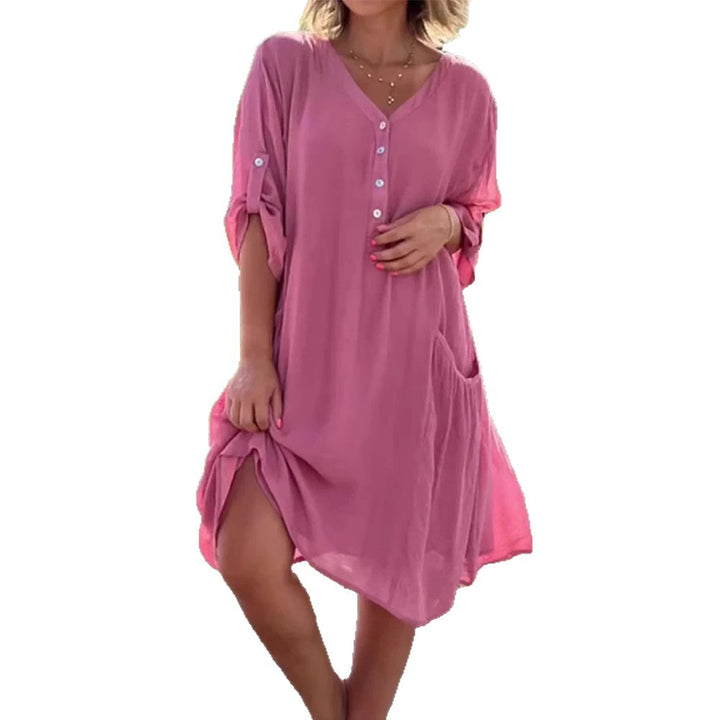 Women's lightweight V-neck beach dress with button placket, rolled sleeves, and patch side pockets StylebySassy