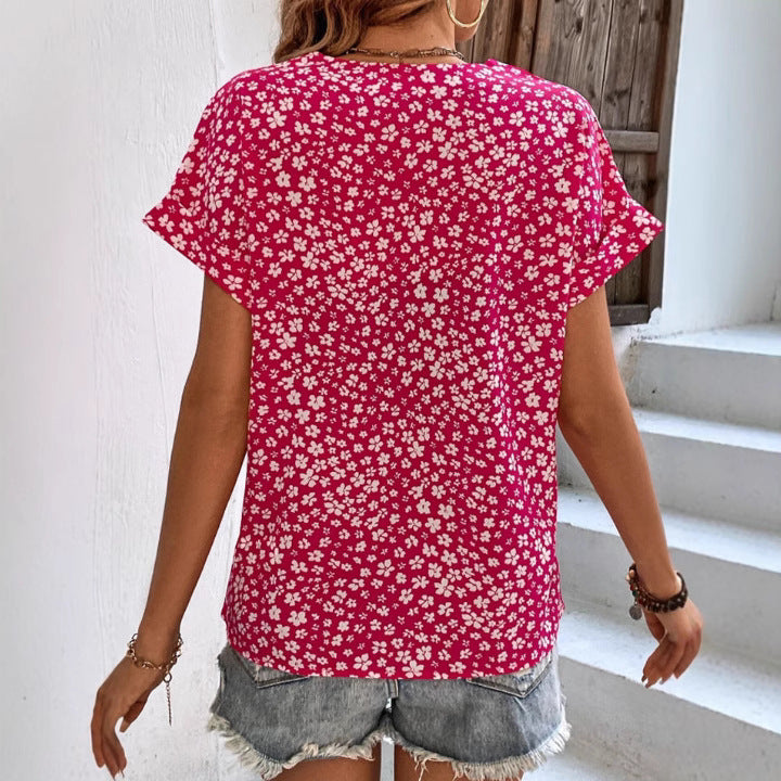 Women's lightweight viscose short sleeve blouse with V-neck, heart decorative button placket and casual hip length StylebySassy