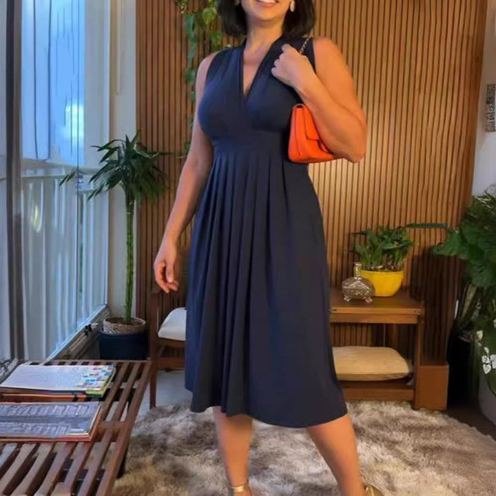 Women's sleeveless V-neck midi dress with underbust seam and flattering pleated skirt StylebySassy