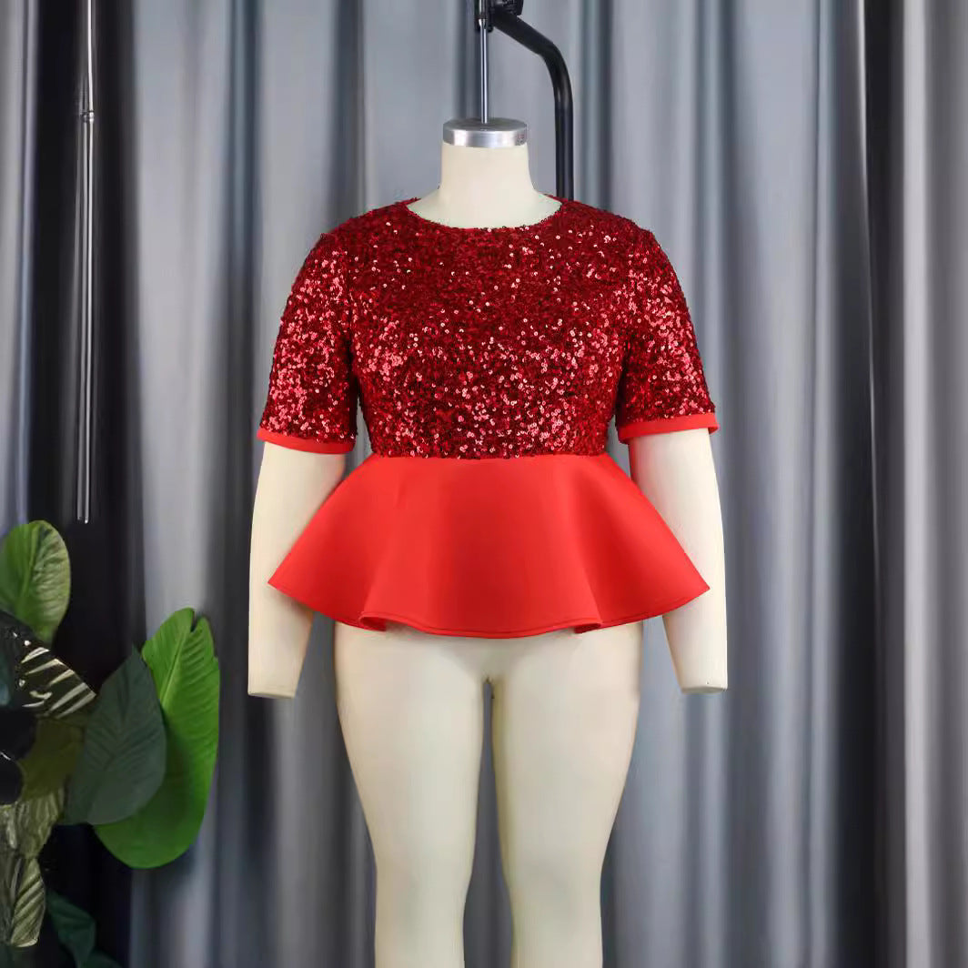 Ladies elegant glitter top with swinging peplum