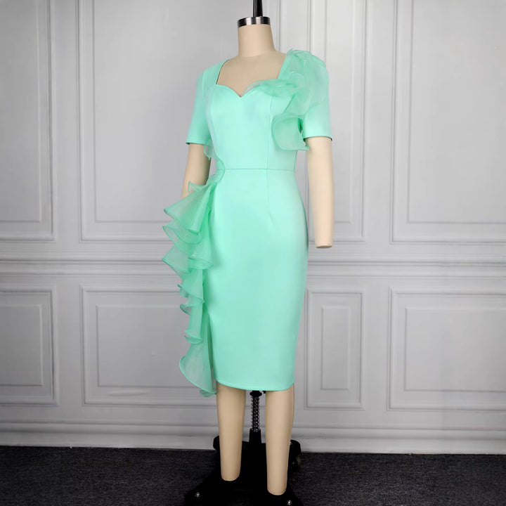 Women's fitted evening dress with ruffle accents StylebySassy