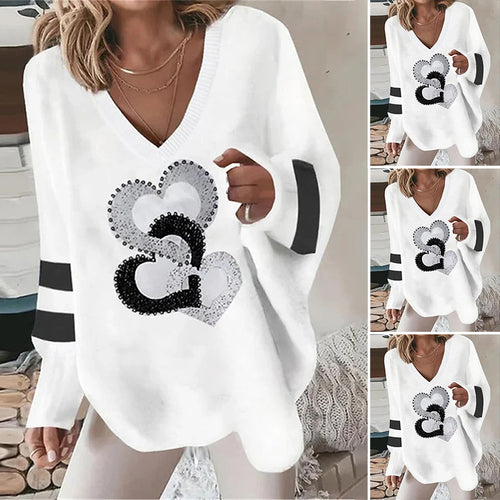 Women's oversized knitted sweater with deep neckline sequin heart and contrast sleeve stripes StylebySassy