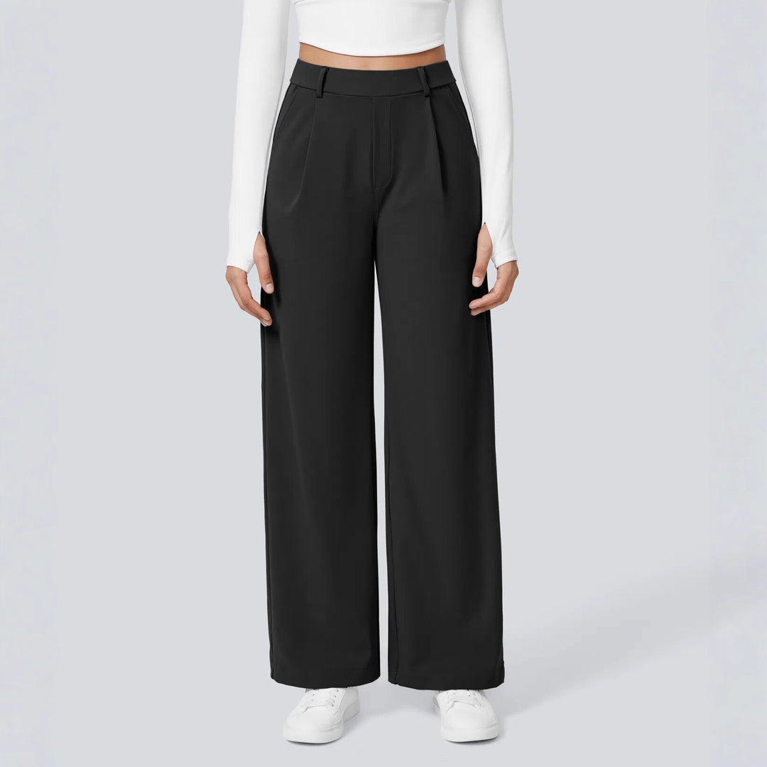 Ladies high-waisted pleated trousers with wide leg, belt loops and side pockets StylebySassy