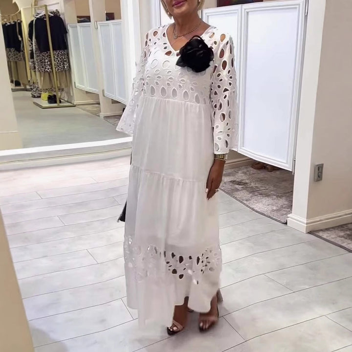 Women's maxi dress with openwork embroidery, V-neck, wide bell sleeves, and tiered hem StylebySassy
