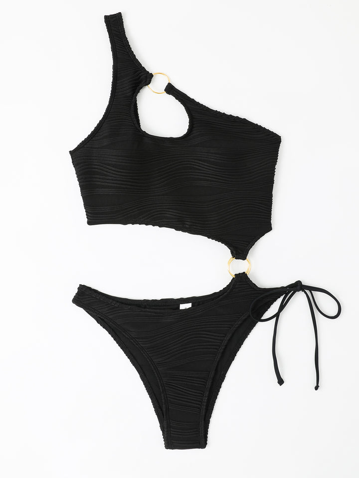 Women's one-piece swimsuit with asymmetrical cut-out and golden accents StylebySassy