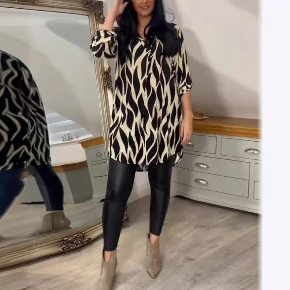 Women's oversized long tunic with abstract wave print, V-neckline and roll-up three-quarter sleeves StylebySassy