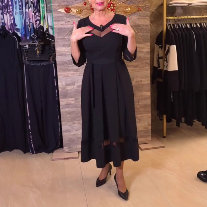 Women's fitted midi dress with transparent mesh inserts, tie belt and feminine A-line StylebySassy