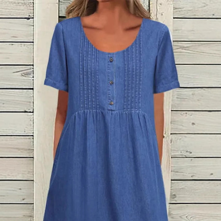 Ladies' knee-length dress in denim look with round neckline, chest piping and side inset pockets StylebySassy