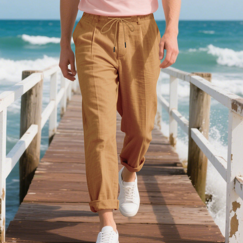 Men's beach-suitable linen blend lounge pants with elastic drawstring, subtle pleat, and rolled ankle hem StylebySassy