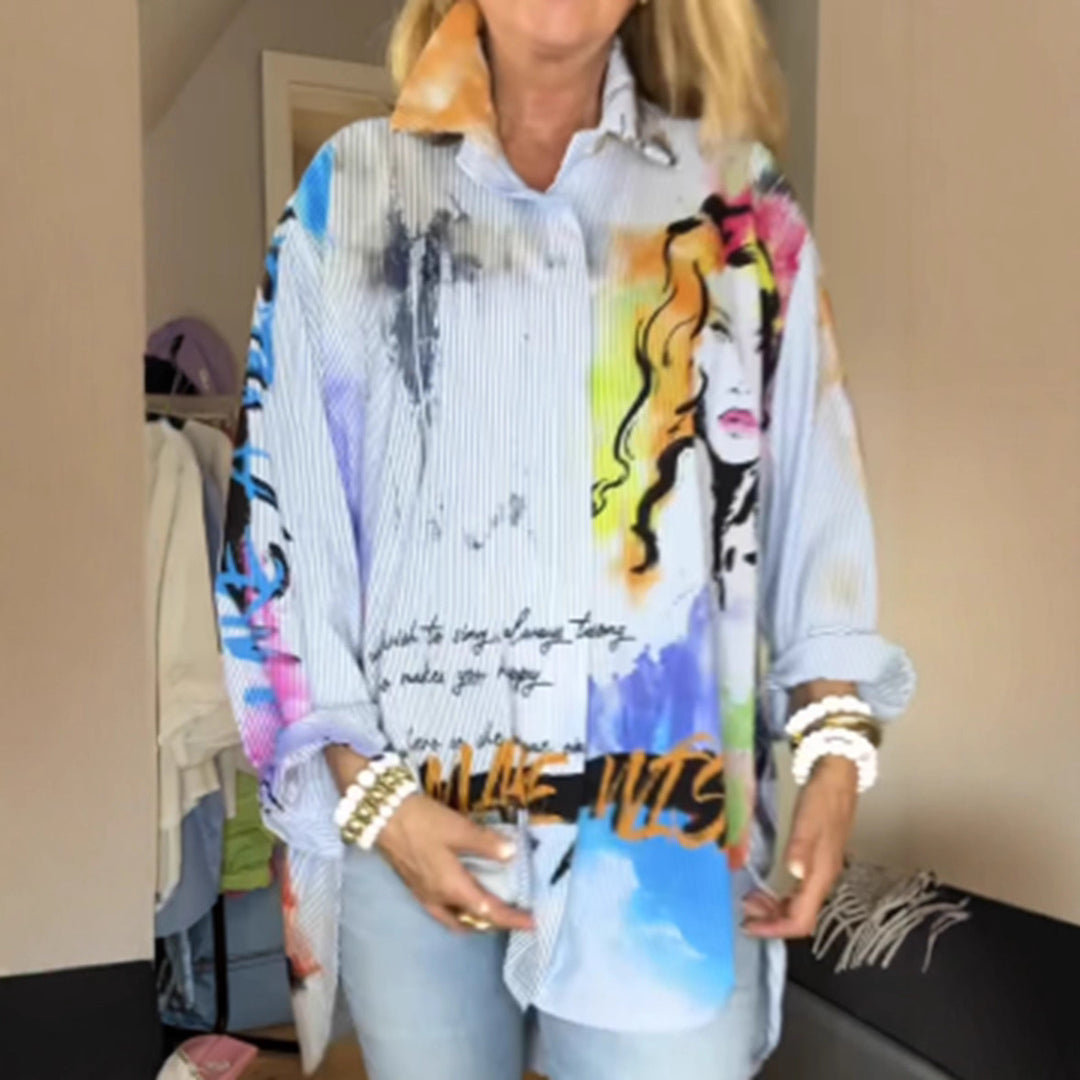Ladies loose-fitting shirt blouse with artistic graffiti print, fine pinstripe texture and extended hem StylebySassy