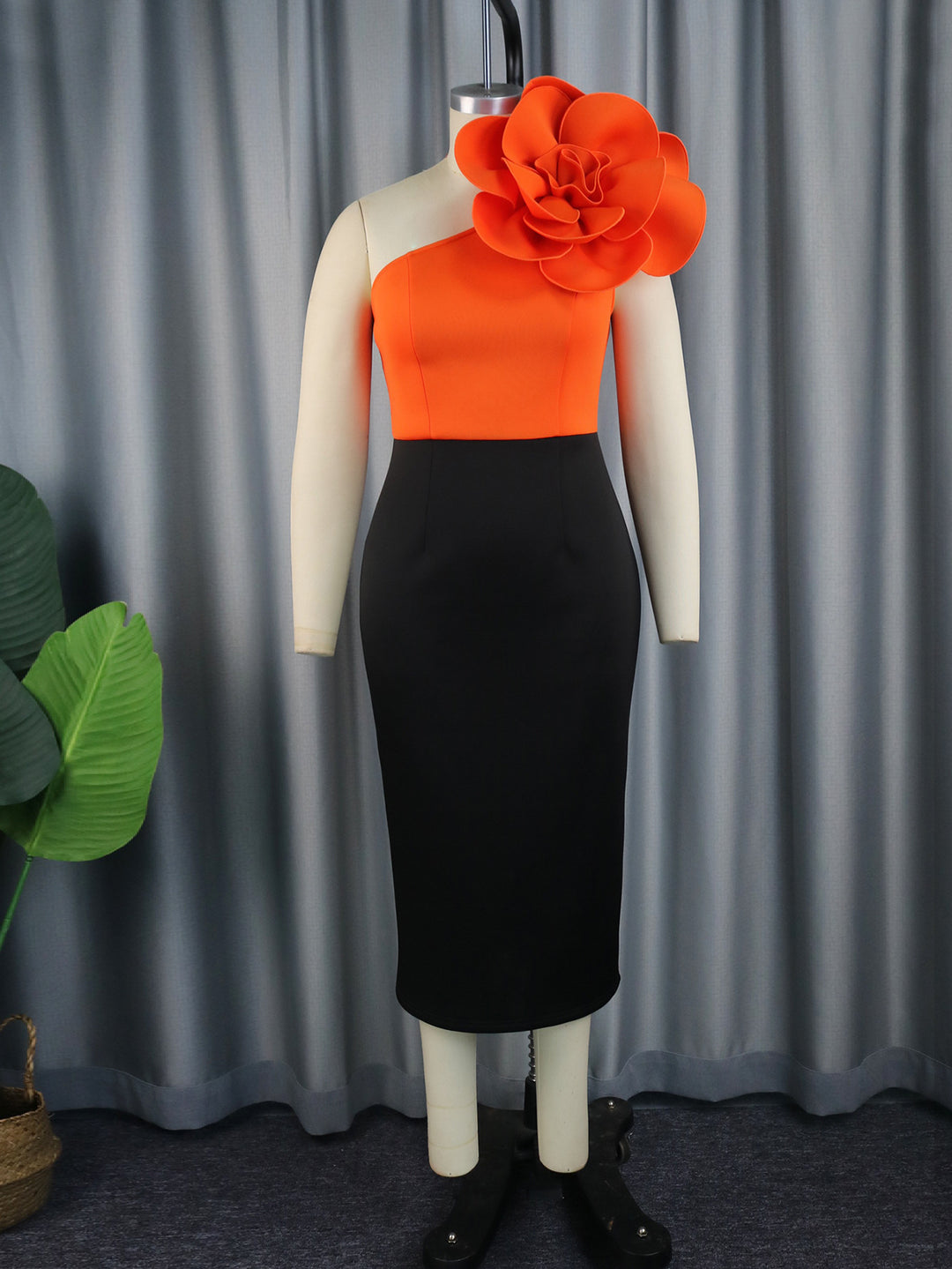 Women fitted dress with asymmetric floral accent StylebySassy