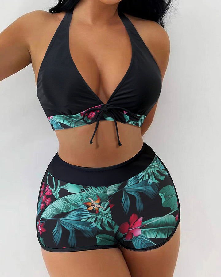 Women's bikini set with sporty high-waist cut and playful floral pattern StylebySassy