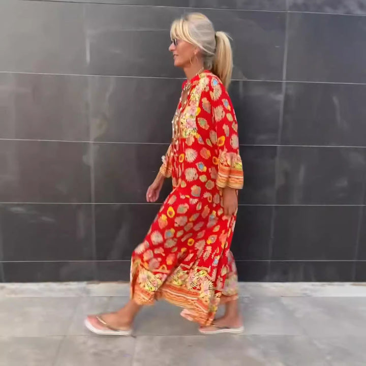 Women's airy kaftan midi dress with folk-inspired border print, V-neckline, tassel ties, and flounce bell sleeves StylebySassy