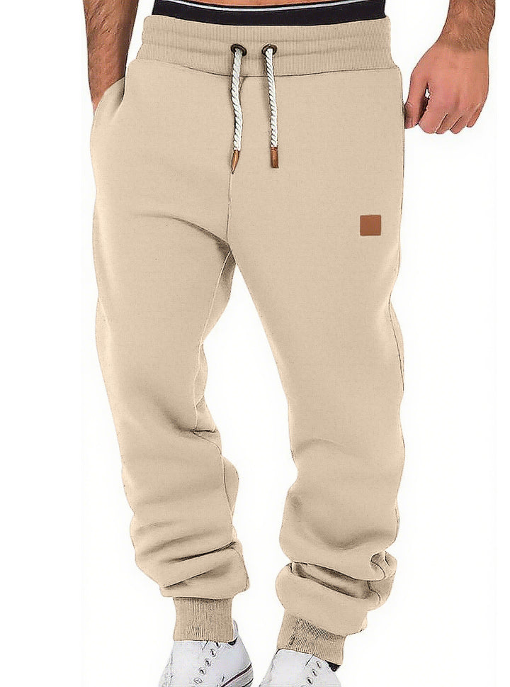 Men's comfortable jogging pants made of high-quality cotton blend with elastic waistband, drawstring, and cuffs StylebySassy