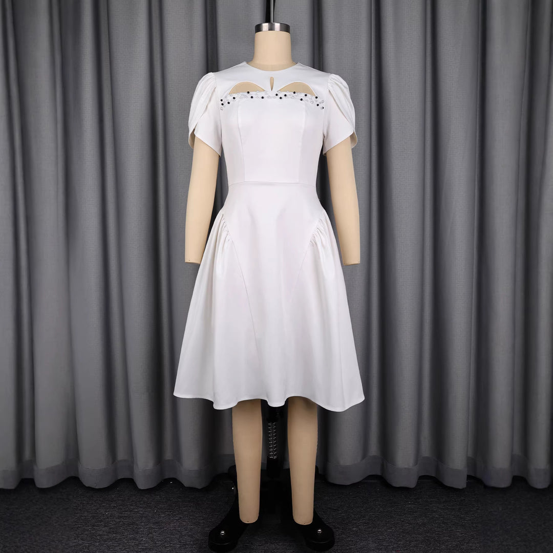 Ladies evening dress with voluminous puff sleeves and refined cut-outs