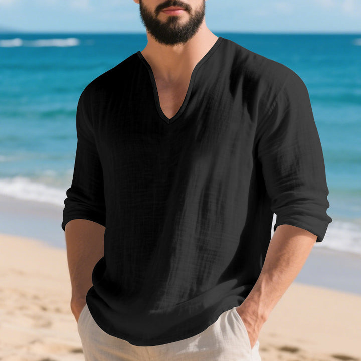 Men's lightweight linen V-neck shirt with a loose fit and roll-up sleeves StylebySassy