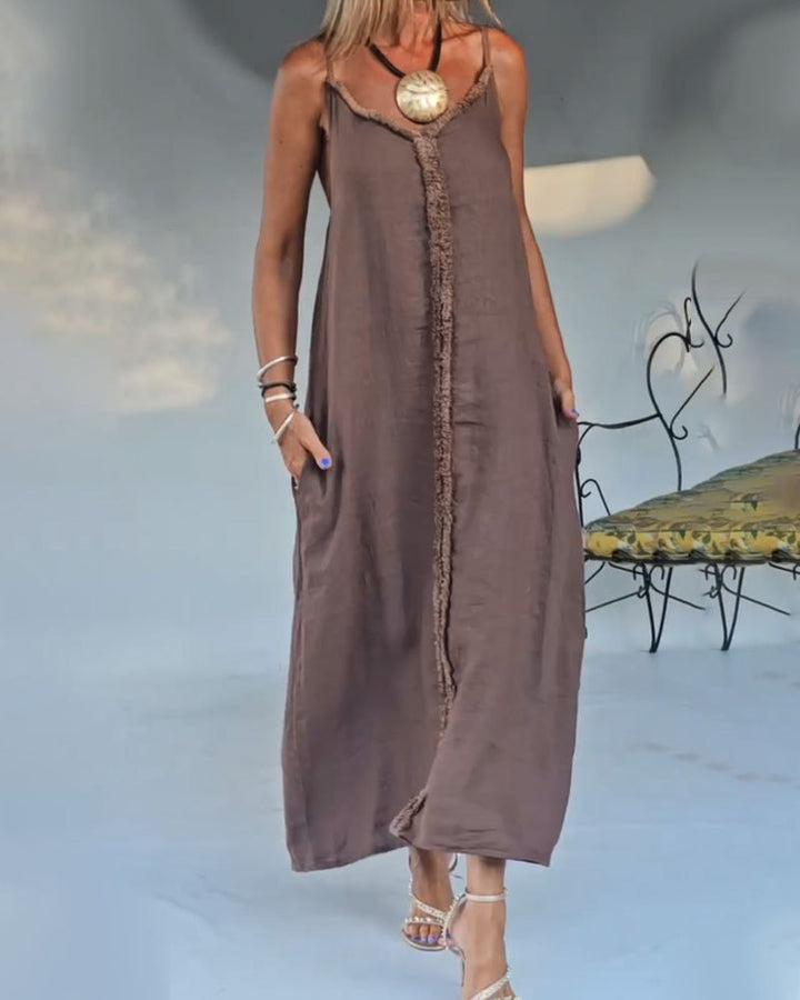 Women's airy linen-look maxi strap dress with fringed center seam and inset pockets StylebySassy