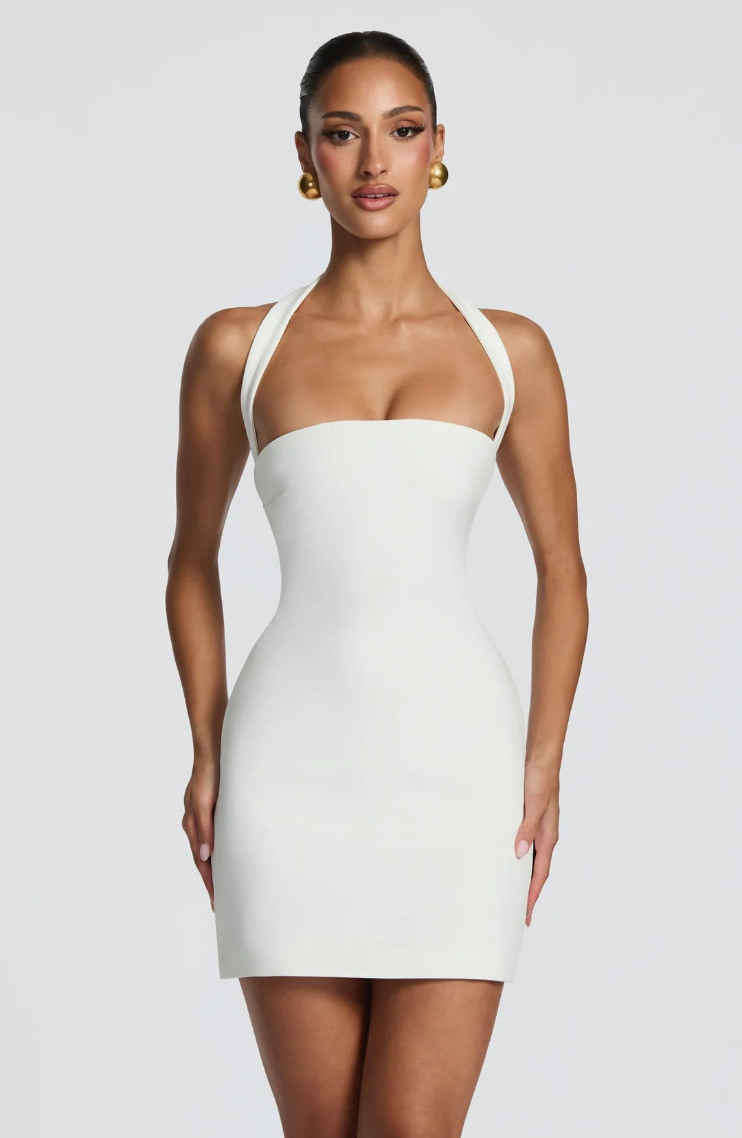 Women's elegant halter dress with fitted silhouette StylebySassy