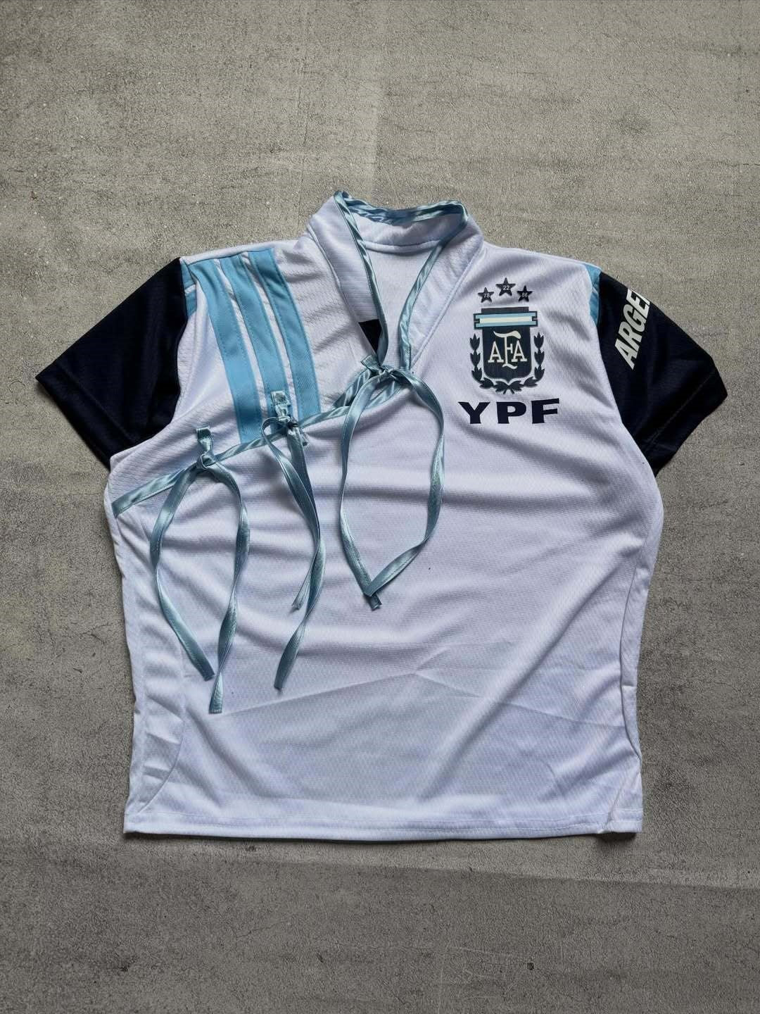 Women's sports jersey with a figure-hugging cut and innovative ties StylebySassy