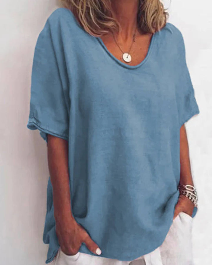 Women's loosely cut linen blend relaxed shirt with round neck, dropped sleeves and side slits StylebySassy