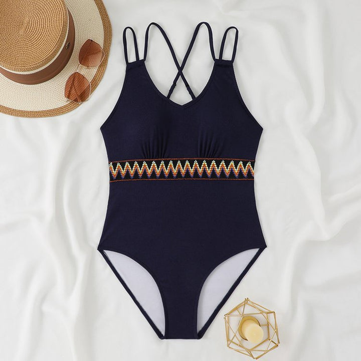Women's One-Piece Swimsuit with Stylish Back Cutout and Decorative Cuff StylebySassy