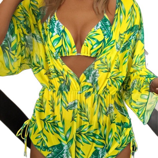 Women's swimsuit with elegant V-neckline and playful palm print StylebySassy