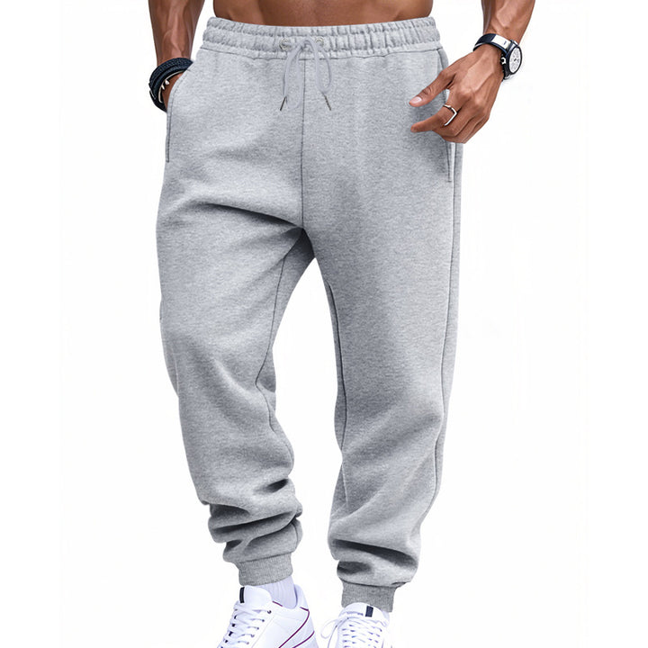 Men's sporty sweat jogging pants with elastic tunnel drawstring waist, ribbed cuffs, and deep side pockets StylebySassy
