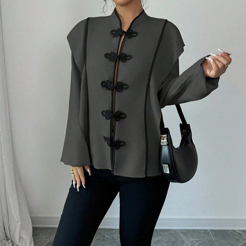 Women's stand-up collar blouse with decorative knot closures and decorative piping StylebySassy