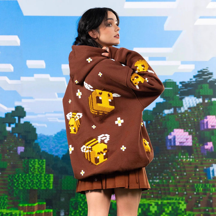 Unisex hoodie with woven pixel bee motif and attached kangaroo pocket StylebySassy
