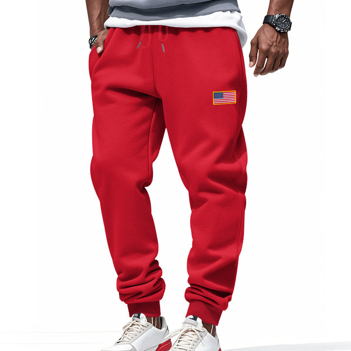 Men's slim-fit sweatpants with tapered leg, elastic drawstring waistband, and discreet flag application StylebySassy