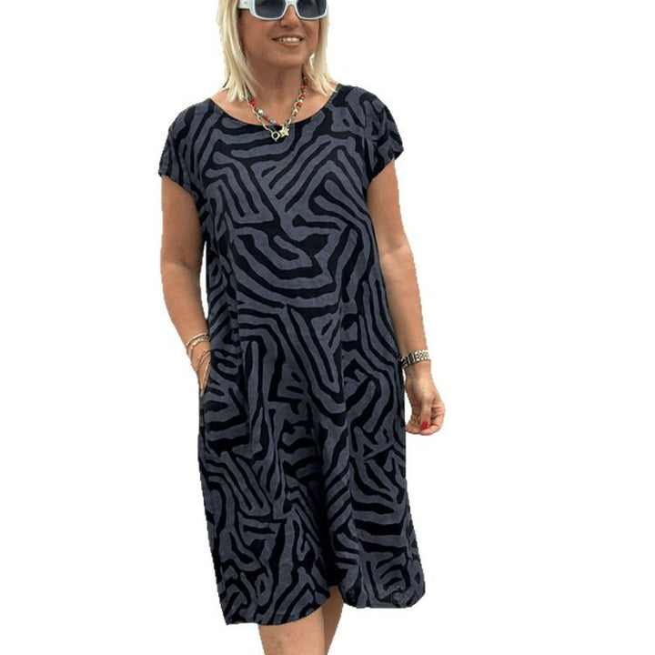 Women knee-length A-line midi dress with textured jacquard look and round neckline StylebySassy