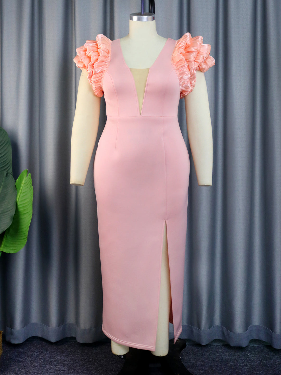 Women’s maxi dress with extravagant ruffle and deep V-neck StylebySassy