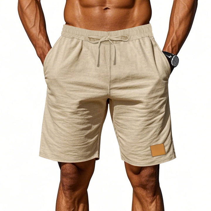 Men's drawstring Bermuda shorts made of soft cotton blend with elastic waistband and side pockets StylebySassy