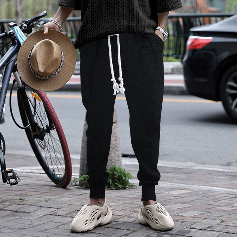 Men's textured knit jogging pants with distinctive drawstring and ribbed ankle cuffs StylebySassy