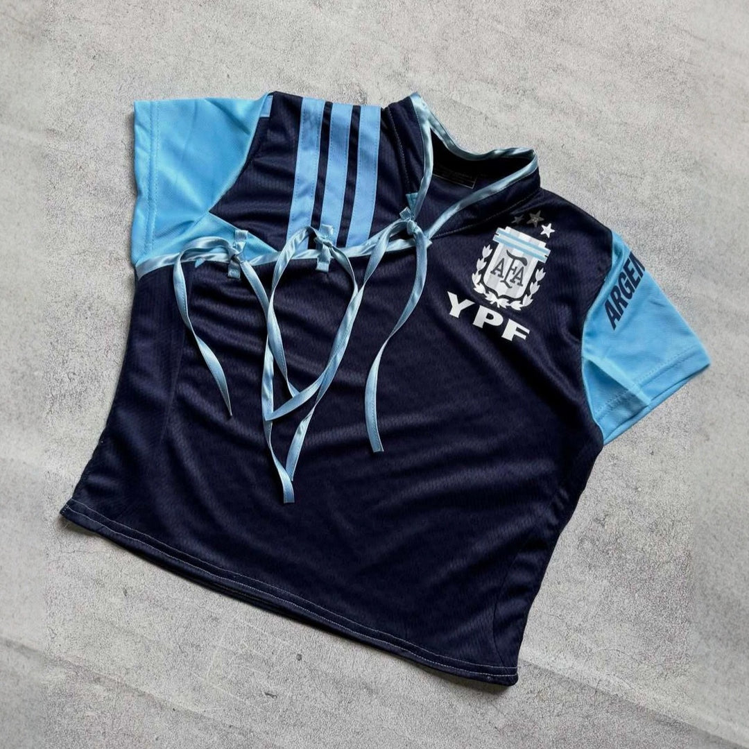 Women's sports jersey with a figure-hugging cut and innovative ties StylebySassy