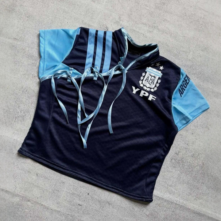 Women's sports jersey with a figure-hugging cut and innovative ties StylebySassy