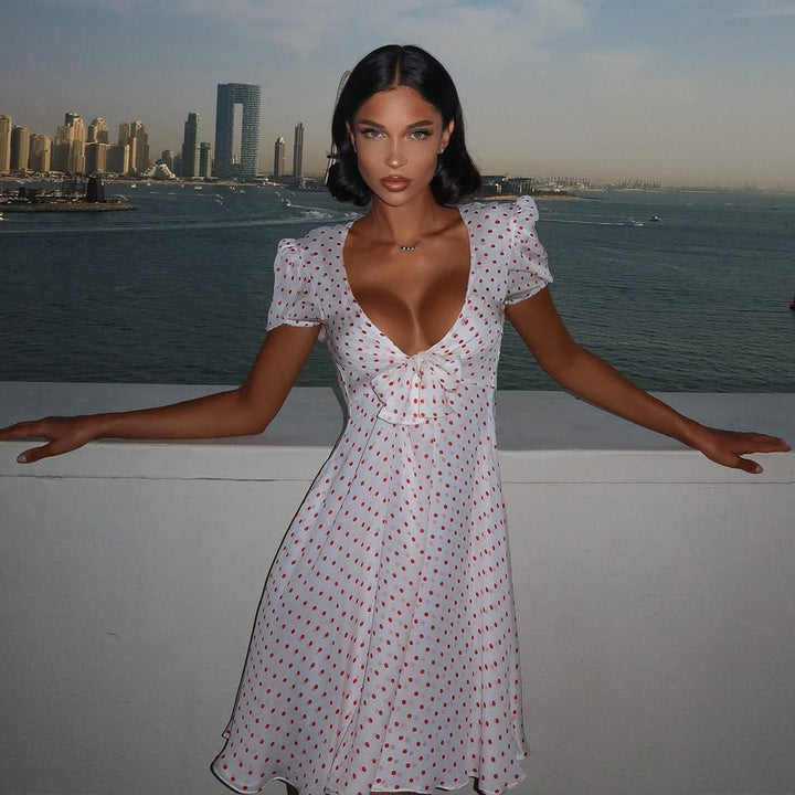 Women playful mini dress with puff sleeves and heart-shaped neckline StylebySassy