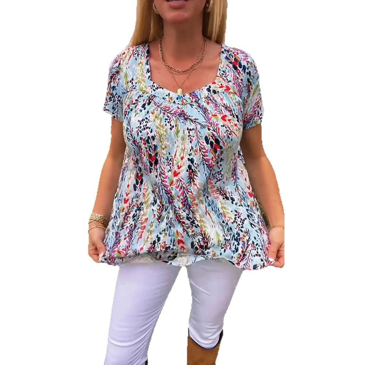 Women's lightweight floral round neck printed shirt with bust pleats and casual hip length StylebySassy