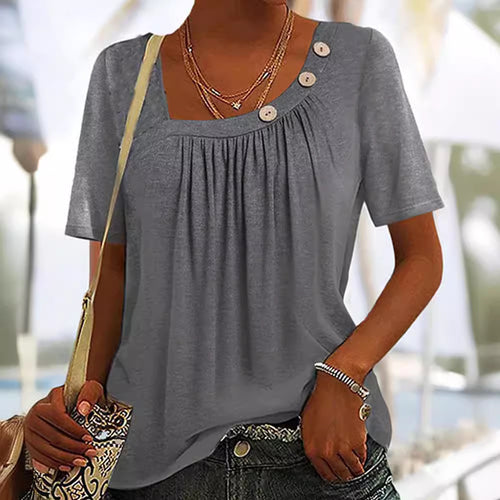 Ladies' lightweight short-sleeve tunic with square neckline, fine gathering, and asymmetric decorative buttons StylebySassy