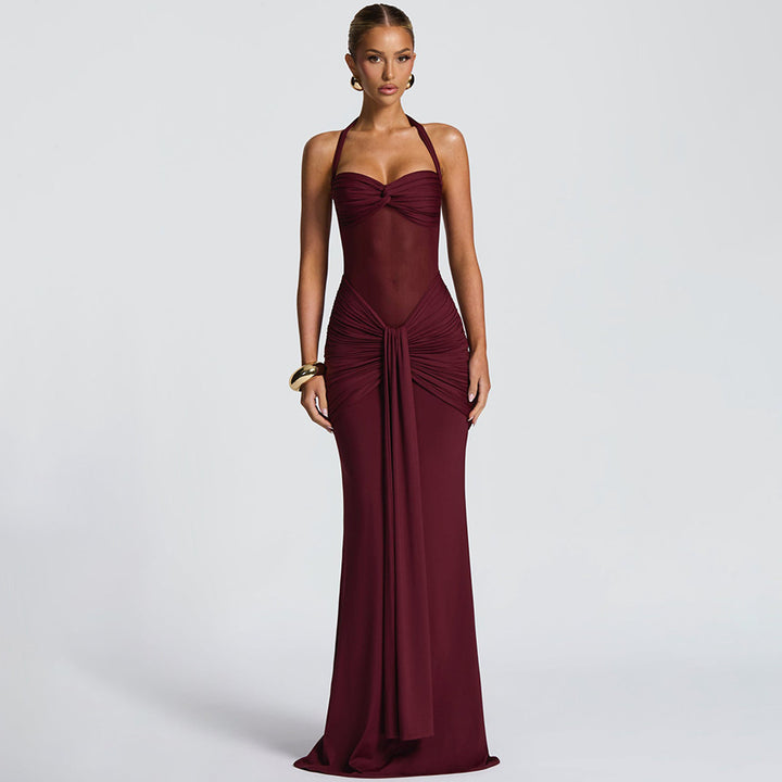 Women's figure-hugging halter evening dress with transparent mesh insert and gathered hip area StylebySassy