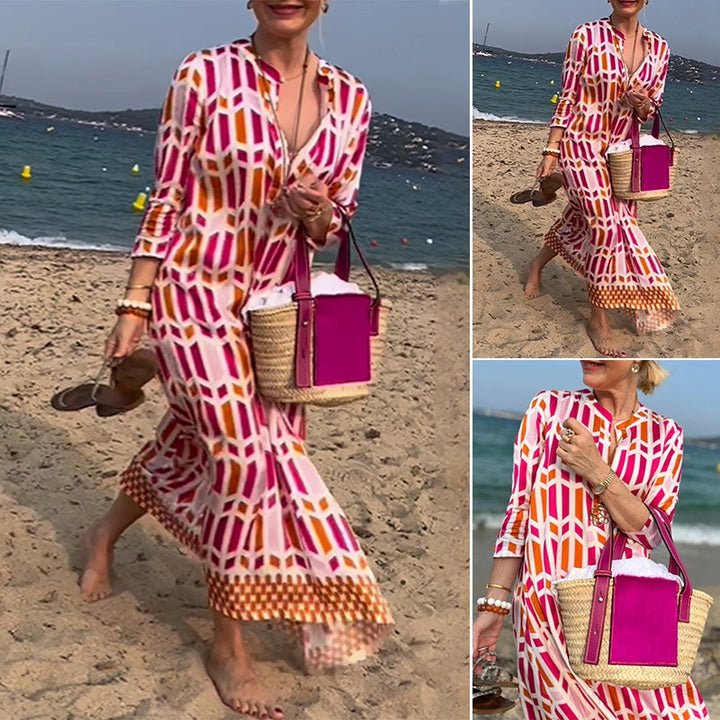 Women's flowing maxi dress with graphic all-over print, V-neck and three-quarter sleeves StylebySassy