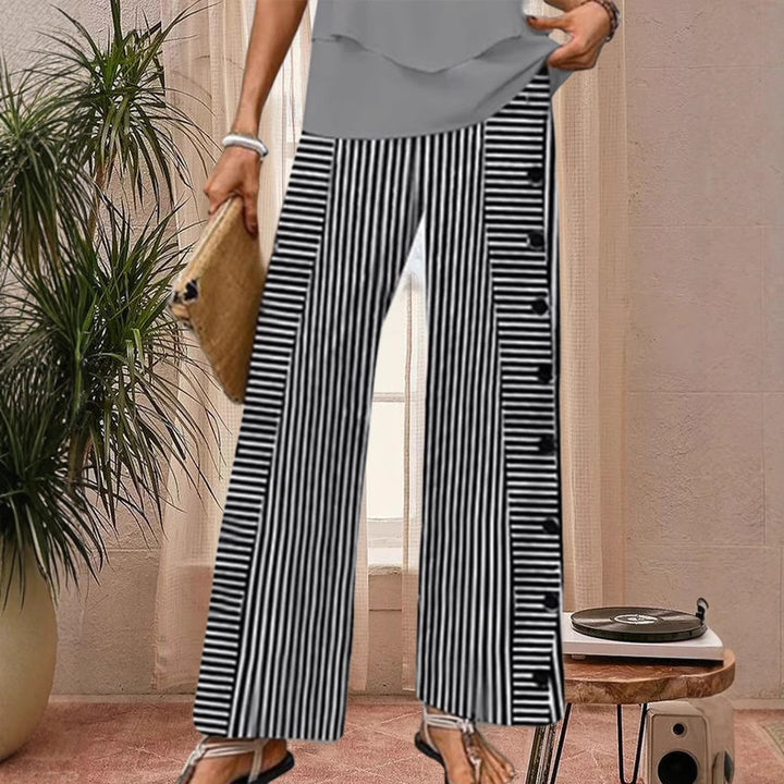 Ladies' wide Palazzo pants with vertical pinstripe look and side button placket StylebySassy