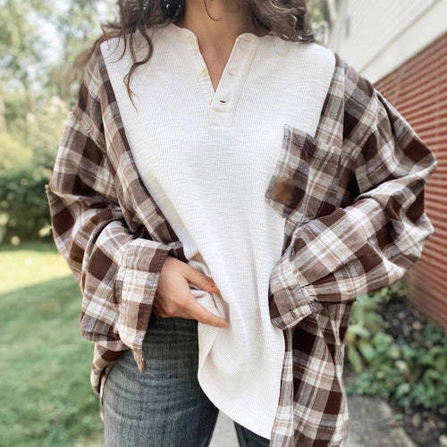 Women's checkered flannel overshirt with patch chest pocket, roll-up sleeves, and relaxed oversized fit StylebySassy