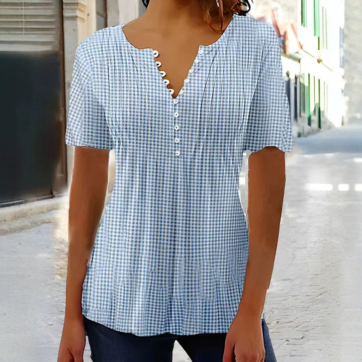 Ladies' lightweight checked blouse with V-neck, decorative button placket and tiered ruffle StylebySassy